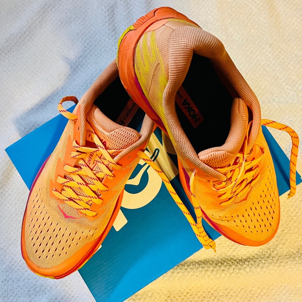 Women’s Hoka Torrent 3 breathable running shoes in mock orange/vibrant orange